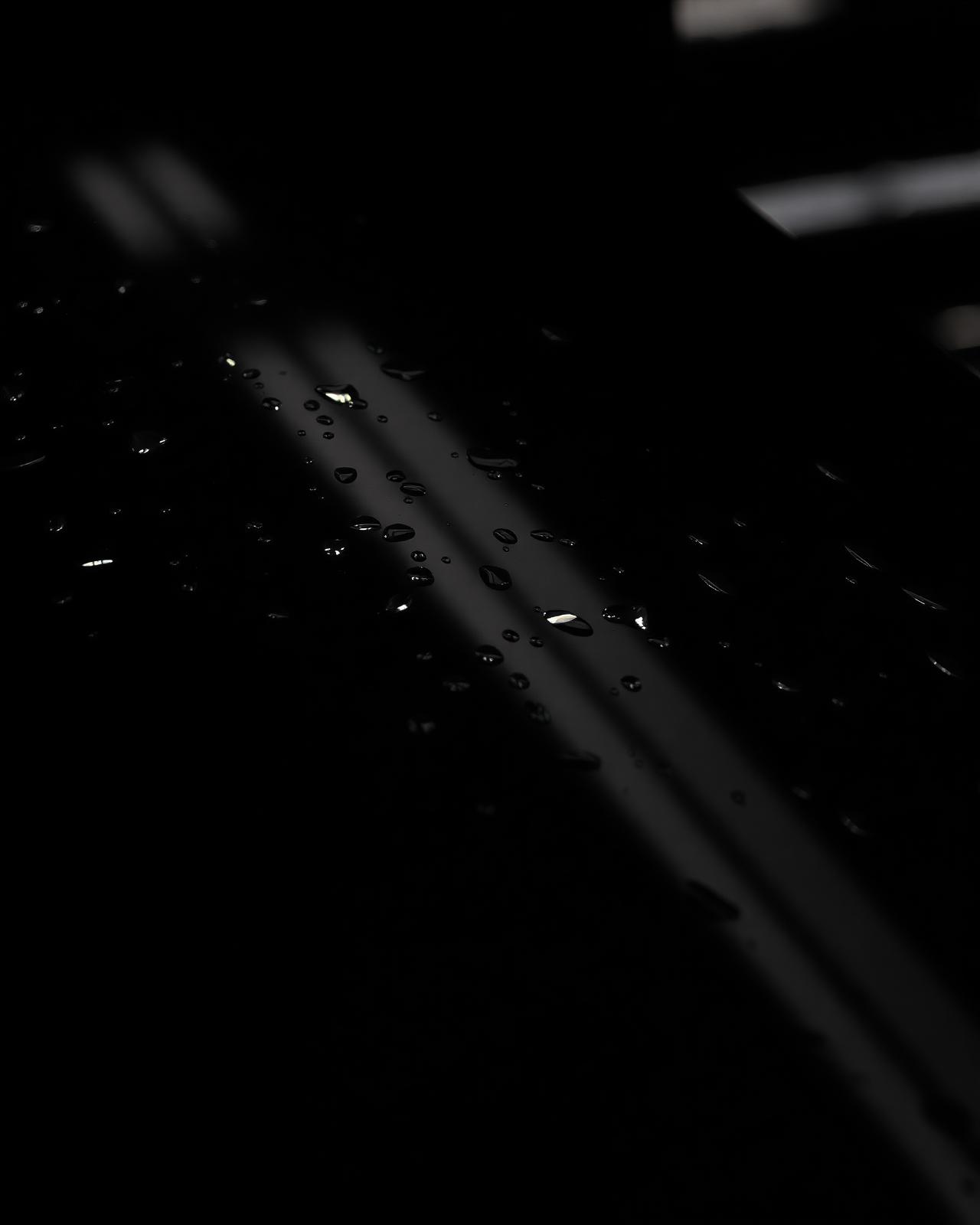 Mirror polished car paint reflecting light